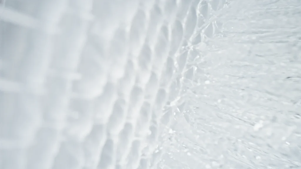 Clear water rippling over clean white fabric